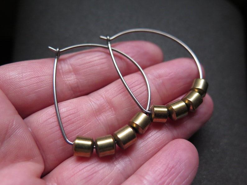 hypoallergenic hoop earrings. silver and gold jewelry. niobium earwires. sensitive ears. image 2