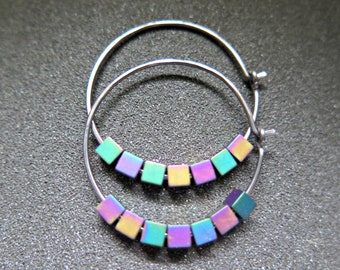 rainbow hematite earrings. 1" niobium hoop earrings with matte cube stones. geometric jewelry made in Canada.