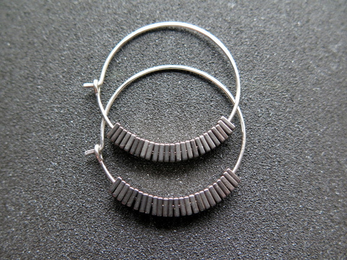 Izzy hematite and brass hoop earrings