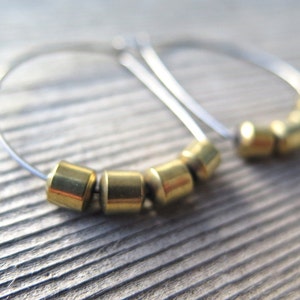 hypoallergenic hoop earrings. silver and gold jewelry. niobium earwires. sensitive ears. image 4