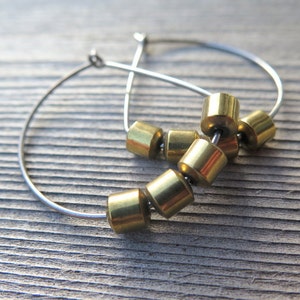 hypoallergenic hoop earrings. silver and gold jewelry. niobium earwires. sensitive ears. image 1