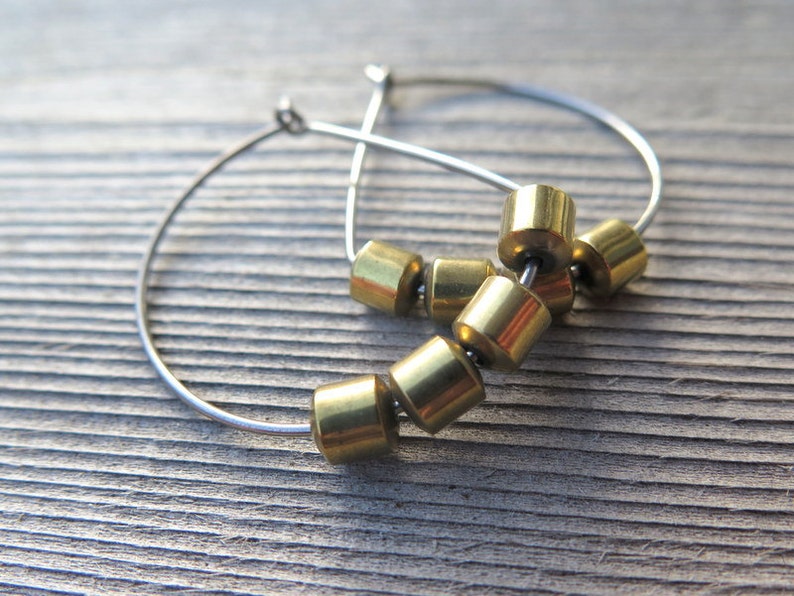 hypoallergenic hoop earrings. silver and gold jewelry. niobium earwires. sensitive ears. image 1