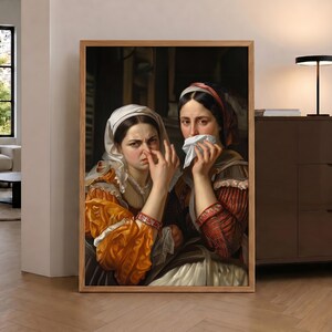 May include: A framed oil painting depicting two individuals in historical attire. One person holds their nose with a hand, while the other covers their mouth and nose with a white cloth. Both wear head coverings and layered garments in shades of orange, red, and white.