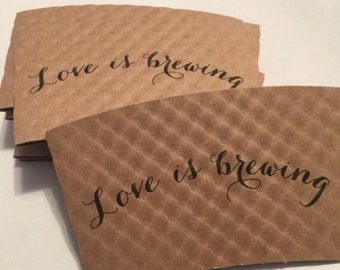 Pack of 50 coffee sleeves with modern calligraphy.  Choose from 3 phrases!  Or mix and match!