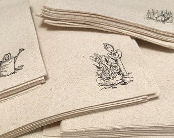 Linen-like paper cocktail napkins featuring Peter Rabbit.  Baby shower napkins. Pack of 16.