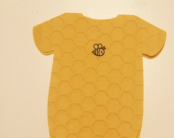 Baby shower What Will It Bee napkins.  Baby shirt or bib shaped embossed with honeycomb!