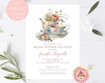 May include: A 5x7 inch printed bridal shower invitation with a floral design featuring a teapot and teacup. The invitation is for a tea party honoring Jennifer Reynolds on Saturday, March 14th from 3:00 to 4:00 PM. The address is 1234 Your Address, City, State 12345. The invitation includes the text "Registered at Crate and Barrel, Amazon & Target" and RSVP information.