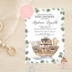 May include: A baby shower invitation with a watercolor illustration of a wooden ark with animals on it. The invitation is printed on a textured paper with a green eucalyptus leaf border. The text on the invitation reads "Please join us for a baby shower honoring Stephanie Reynolds. Saturday, June 19th, 2:00 to 4:30 PM, 1345 Your Address - City, State 12345. Registered at Target & Amazon. RSVP to Angelica 123.456.7890 or angie2email.com."