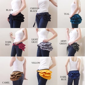 May include: Nine different colors of fabric ruched hip sashes. The sashes are shown on models wearing white tank tops and blue jeans. The colors are: black, chiffon black, teal, dark red, light gray, army green, yellow, camel, and dark blue.