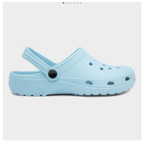 May include: Light blue slip-on clog with a black buckle. The clog has a textured sole and a back strap.