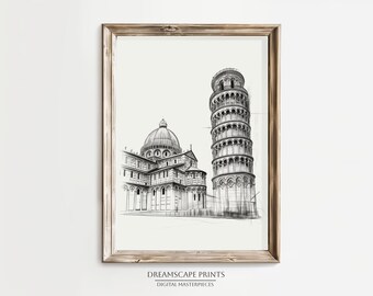 May include: A framed black and white architectural sketch print featuring the Leaning Tower of Pisa and a cathedral. The artwork is set against a cream-colored background and framed in a rustic wooden frame. The print includes the text "DREAMSCAPE PRINTS" and "DIGITAL MASTERPIECES".