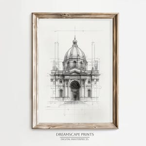 Puede incluir: Una impresión arquitectónica enmarcada con un dibujo detallado en blanco y negro de un edificio con una cúpula. La obra de arte se presenta en un marco de madera marrón claro. El texto "DREAMSCAPE PRINTS DIGITAL MASTERPIECES" está en la parte inferior.