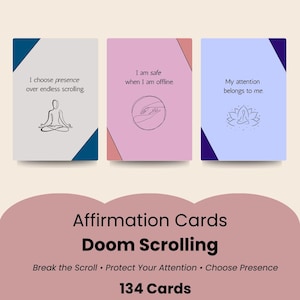 May include: Three rectangular affirmation cards with colored corners. The first is gray with a blue corner and a person meditating. The second is pink with a red corner and a circle with hands. The third is light blue with a dark blue corner and a lotus.