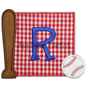 May include: A red and white gingham fabric square with a blue letter R, a brown baseball bat, and a white baseball with red stitching.