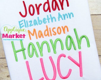 May include: A white t-shirt with five names embroidered in different colors: Jordan in red, Elizabeth Ann in light blue, Madison in orange, Hannah in green, and Lucy in pink.