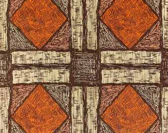 Peut inclure: Un tissu brun et beige avec un motif géométrique de diamants orange. Le tissu a une surface texturée.