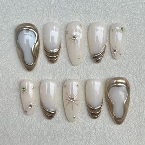 Gold metallic white French celebrity hand painted nails, elegant wedding nails, custom pressed nails,gold 3D chrome nails,sun star nails