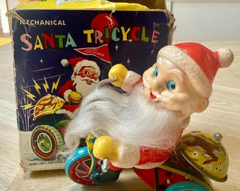ヴィンテージのブリキ製サンタクロース三輪車 - 日本製ゼンマイ仕掛け