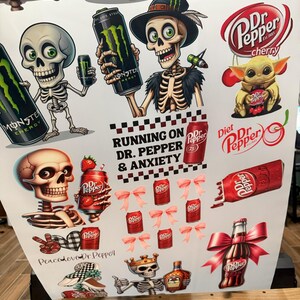 May include: A digital print featuring a variety of images, including skeletons, Dr Pepper cans, and a cartoon character. The print includes the text "Running on Dr. Pepper & Anxiety".
