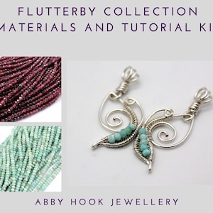Puede incluir: Un kit para hacer joyas con dos hilos de cuentas, uno rojo y otro verde, y un dije de mariposa plateado. El kit se titula "Flutterby Collection Materials and Tutorial Kit" y es de Abby Hook Jewellery.