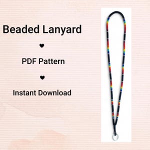 May include: A beaded lanyard with a black cord and colourful beads in rainbow hues. The lanyard has a metal ring at the bottom. Text on the left says "Beaded Lanyard", "PDF Pattern", and "Instant Download".
