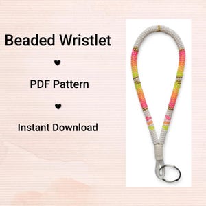 May include: A beaded wristlet with a white base, accented with sections of neon pink, orange, and yellow beads. Gold-colored beads separate the color blocks. The wristlet has a silver-colored key ring attached. Text on the left reads "Beaded Wristlet", "PDF Pattern", and "Instant Download".