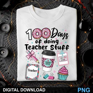 May include: White t-shirt featuring a colourful graphic celebrating "100 Days of doing Teacher Stuff." The design includes donuts, a coffee cup, a pencil, a cupcake, and the words "Teacher Coffee" and "Hello Teacher."