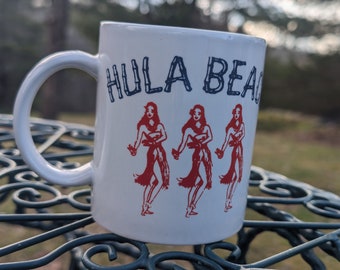 Vintage kitschy cool Hula Beach Cape Cod MA retro tourist mug red hula girl design blue bamboo font lettering coffee or tea mug