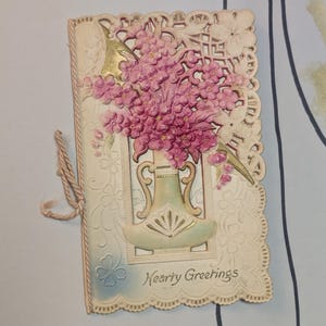 Hearty Greetings - A Bright And Happy New Year To You highly ornate embossed flower and lace antique art nouveau greeting card