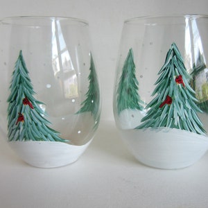 2  WINTER EVERGREEN STEMLESS Trees Glasses***  With Cardinals Hand Painted  Wine  Glasses