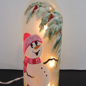 Snowman Feeding the Cardinals Next to a  Whimsical Evergreen Tree **** Cardinals on a Frosted Lighted Bottle** Electric Lights