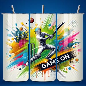 Pode incluir: Três copos de aço inoxidável branco com um design abstrato colorido que apresenta um jogador de cricket em ação. O design inclui respingos de cor, um bastão de críquete e as palavras "GAME ON".