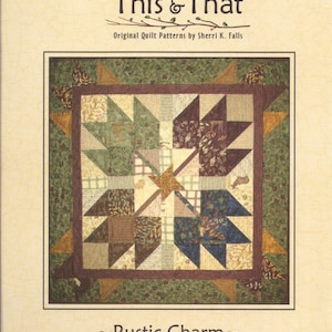 May include: A quilt pattern booklet cover featuring a quilt design with a rustic charm theme. The quilt is made with a variety of fabrics in shades of brown, green, and blue. The title of the pattern is "Rustic Charm" and the number "#058" is printed in the bottom right corner.