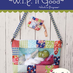 May include: A patchwork fabric project bag with a clear window, showing yarn and knitting needles inside. The bag has a zipper closure and a long strap. The bag is labeled "This & That" and "#283".