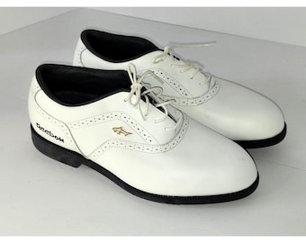 Zapatillas de golf Reebok Greg Norman Collection estilo retro de los años 90 con logo de tiburón para hombre.