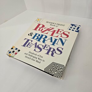 Reader's Digest Book of Puzzles & Brain Teasers 2001