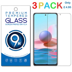 May include: A 3-pack of tempered glass screen protectors for a smartphone. The packaging on the left features the text "PREMIUM TEMPERED GLASS SCREEN PROTECTOR FILM". The phone screen displays a colorful image. The text "3 PACK" is in red, green, and yellow.
