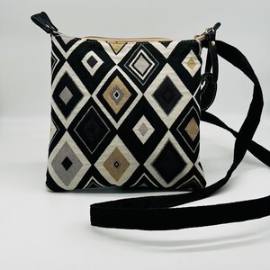 Black, Gold and Silver  Crossbody Bag. “
