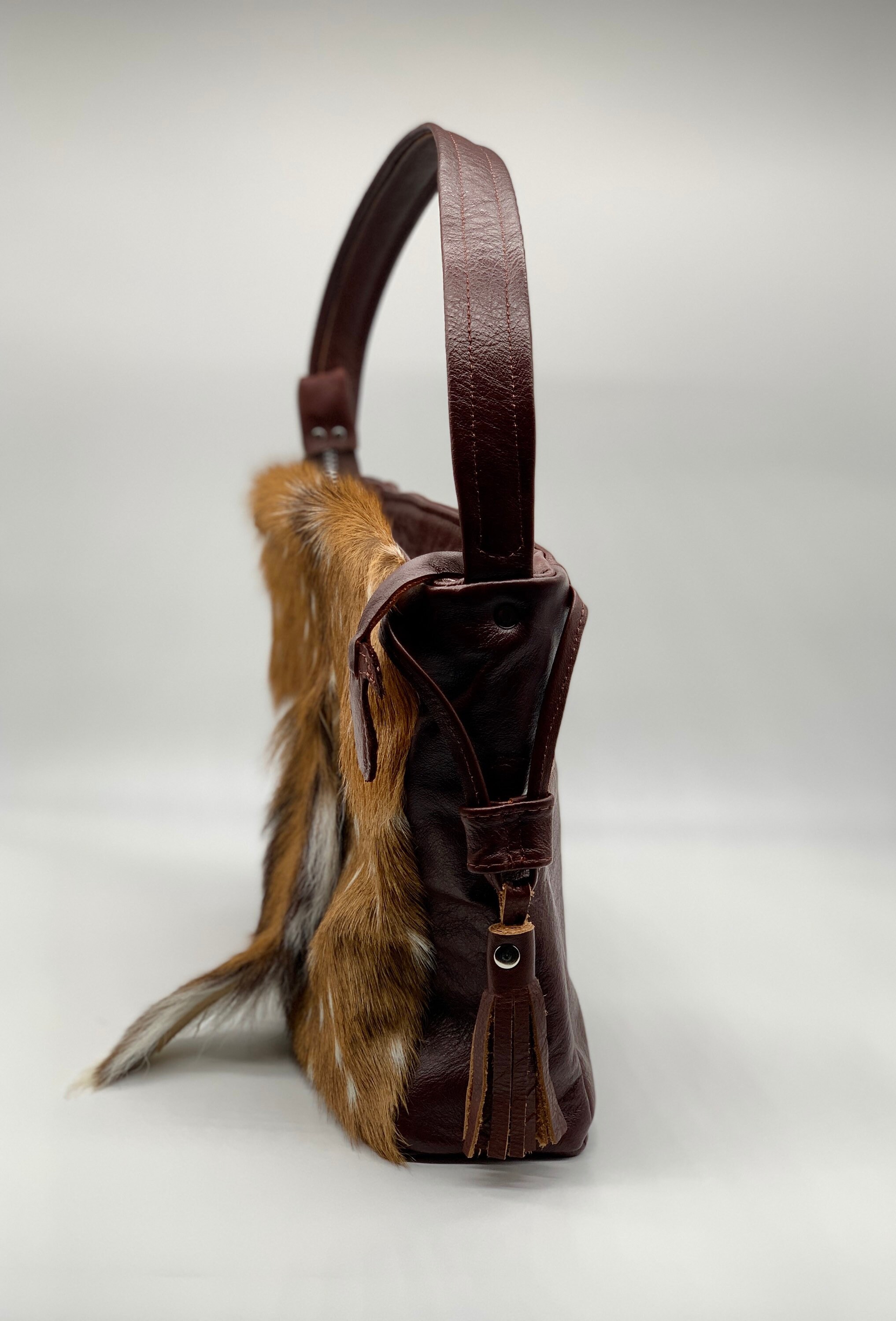 Axis Deer Skin With Tail Showcased Combined With Genuine Cowhide