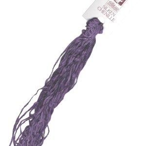 May include: A skein of purple embroidery floss with a white label that reads "Thread Theory Silken Chenille".