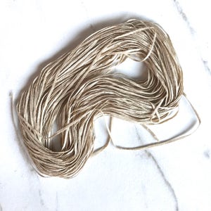 Sea Grass by The ThreadGatherer. SEA 140 Gobi Sands. Cotton Thread. Cotton Fiber. Neutral Floss.