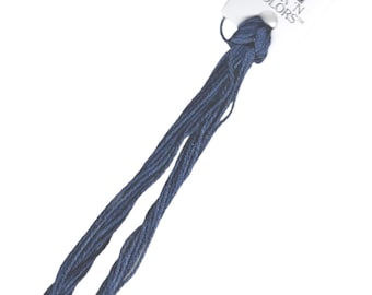 May include: A skein of dark blue embroidery floss with a white label that reads "DMC Silk N Colors™".