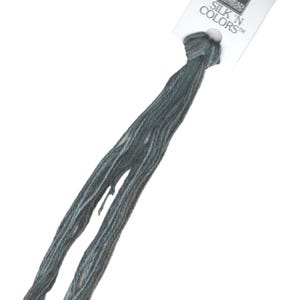 May include: A skein of The Thread Gatherer Silk 'n Colors embroidery floss in a blue-green colour.