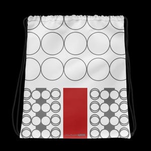 Può includere: Borsa con coulisse bianca con un design geometrico. La borsa presenta un motivo di cerchi grigi e un rettangolo rosso centrale. Sono visibili coulisse nere. Il design della borsa include il testo "Anna Podedworna | Black Line".