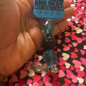 Keep calm and not that calm blue glittery resin retractable badge reel.