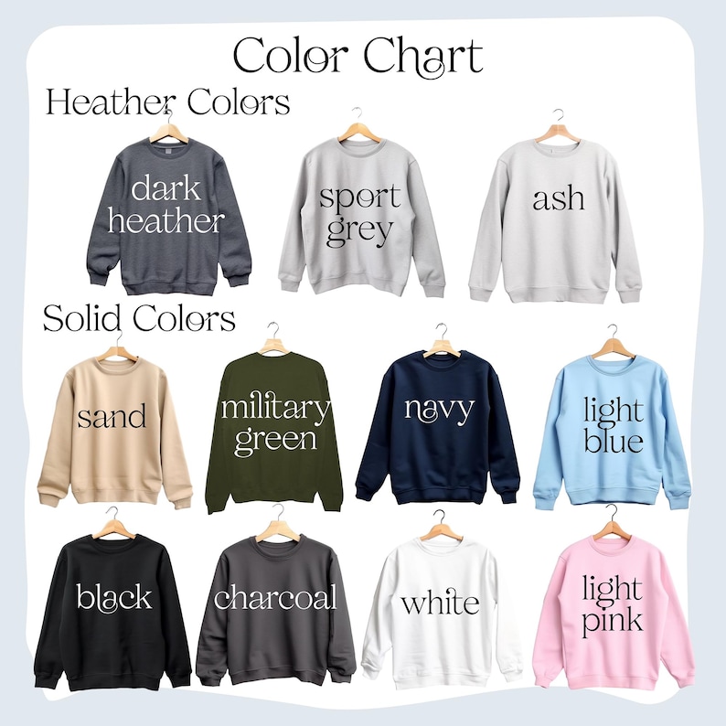 May include: Color chart showing different sweatshirt colors. Heather colors include dark heather, sport grey, and ash. Solid colors include sand, military green, navy, light blue, black, charcoal, white, and light pink.