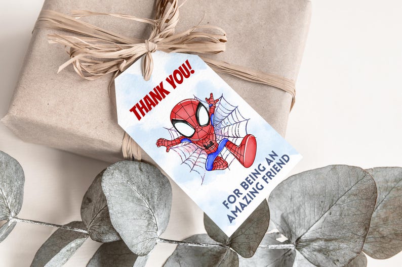 May include: A white thank you tag with a red and blue cartoon Spiderman character. The tag says "Thank You! For being an amazing friend".