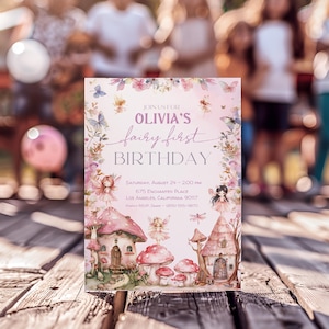 May include: A pink and purple fairy-themed birthday invitation with a watercolor background. The invitation features a whimsical illustration of a fairy house, mushrooms, and butterflies. The text reads "Join us for Olivia's fairy first birthday." The invitation also includes the date, time, and location of the party.