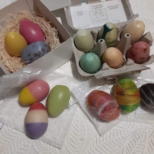 Three egg soaps in a nest image 2