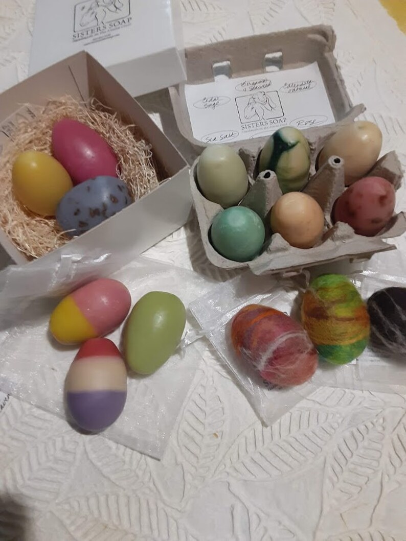 Three egg soaps in a nest image 2